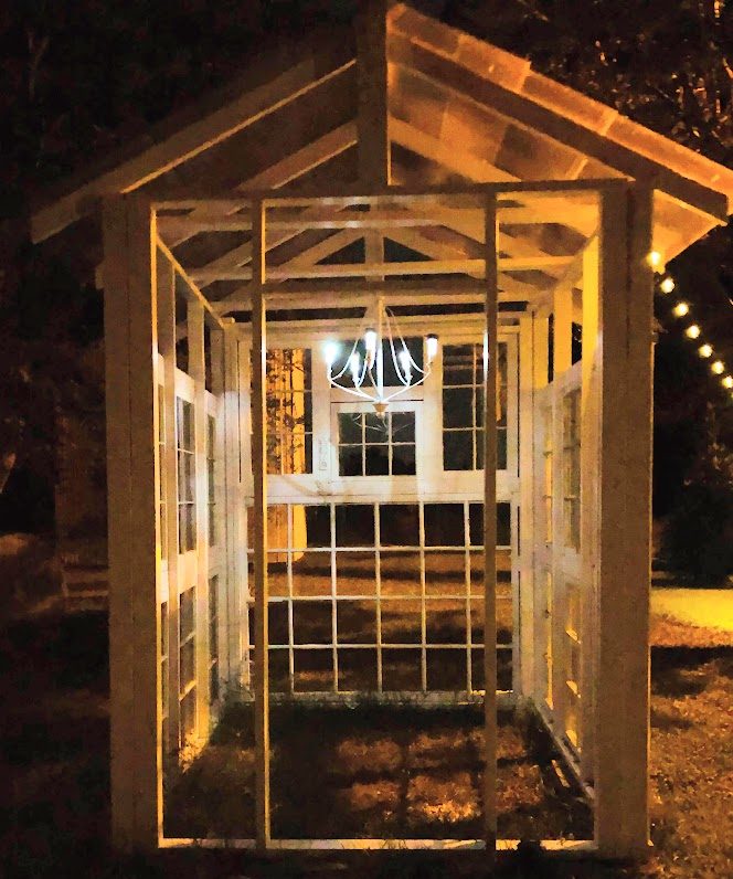 DIY upcycled solar chandelier in a greenhouse